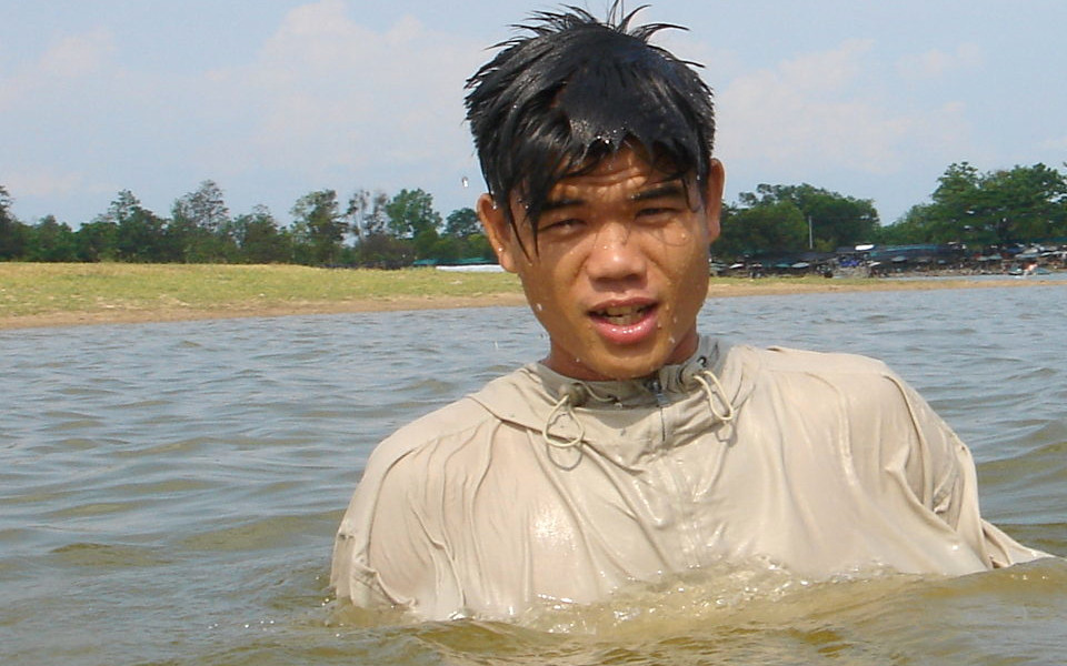 wet ventile anorak swimming in a lake